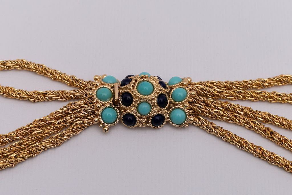 Collier en métal doré et fermoir bijou Dior