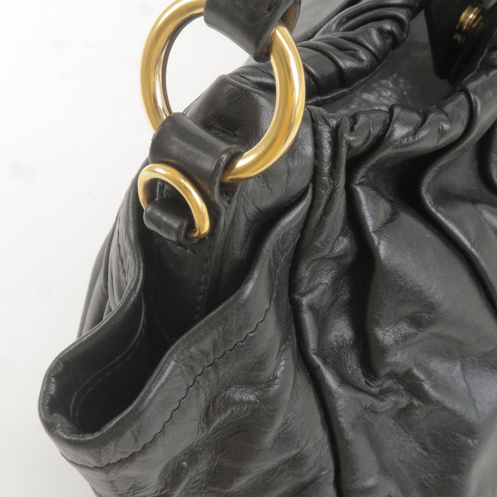 Prada Logo Leather Shoulder Bag With Tassel Black