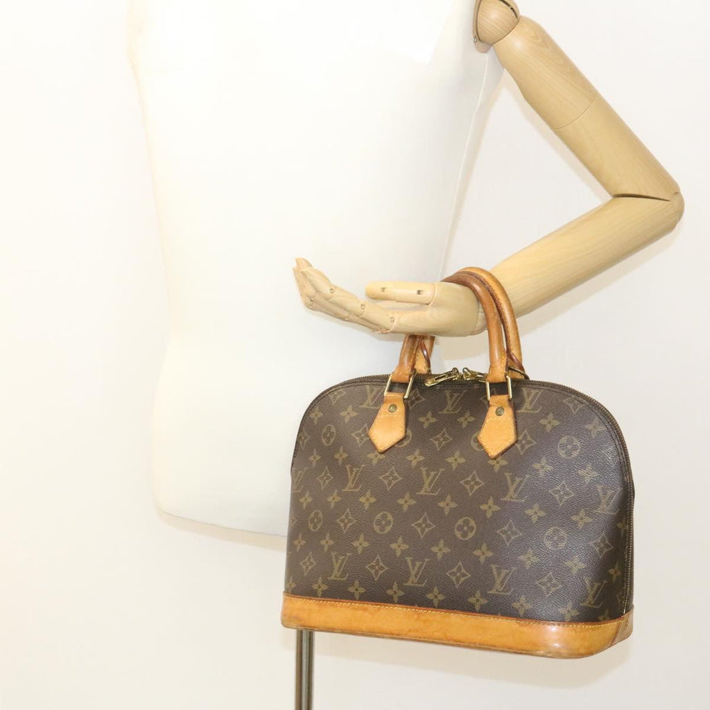 Louis Vuitton Brown Canvas Alma handbag bag