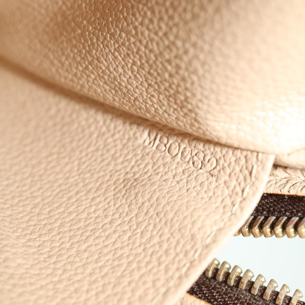 Louis Vuitton Brown Canvas Trousse de Toilette clutch bag