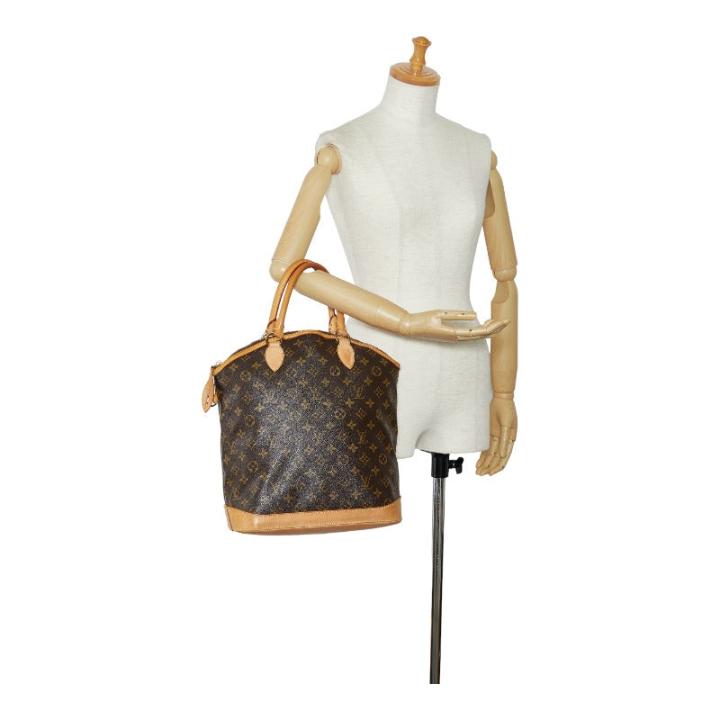 Louis Vuitton Monogram Rockit Vertical Handbag M40103 Brown
