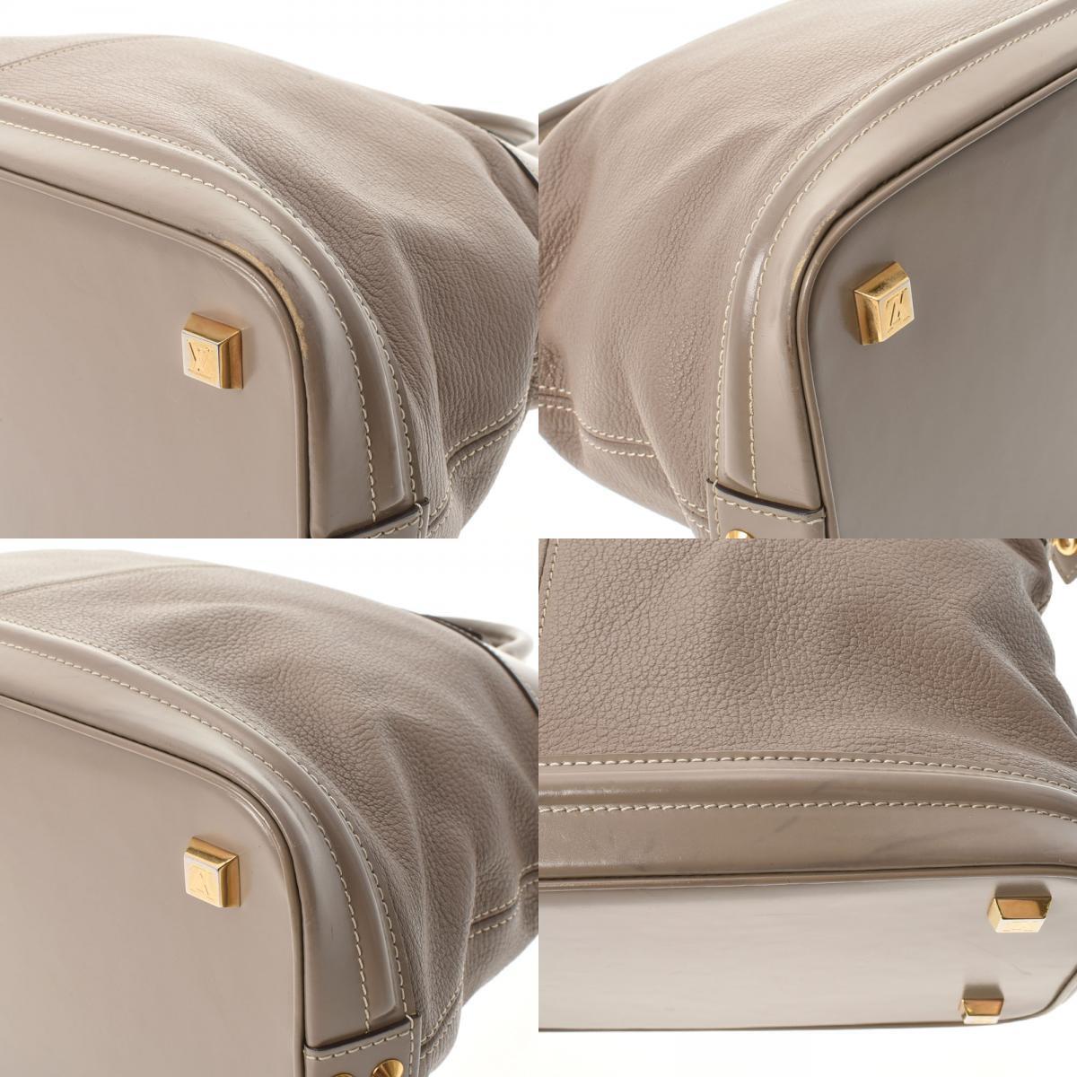 Louis Vuitton Beige Leather Lockit handbag bag
