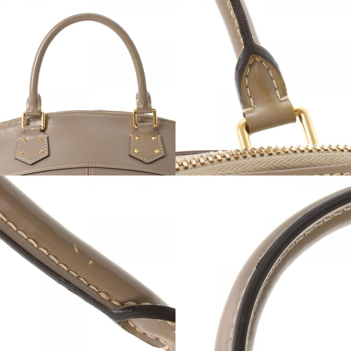 Louis Vuitton Beige Leather Lockit handbag bag