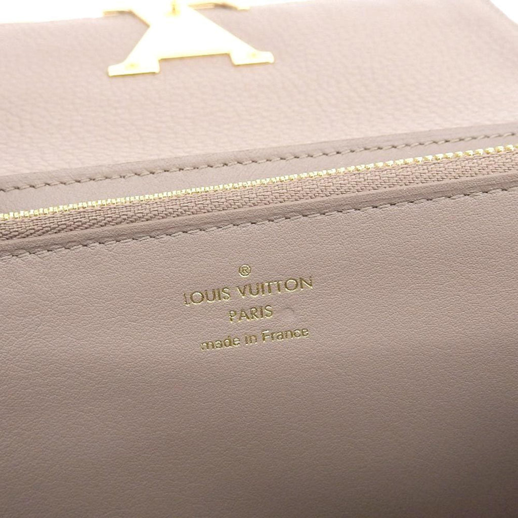 Louis Vuitton Brown Leather Capucines wallet accessories