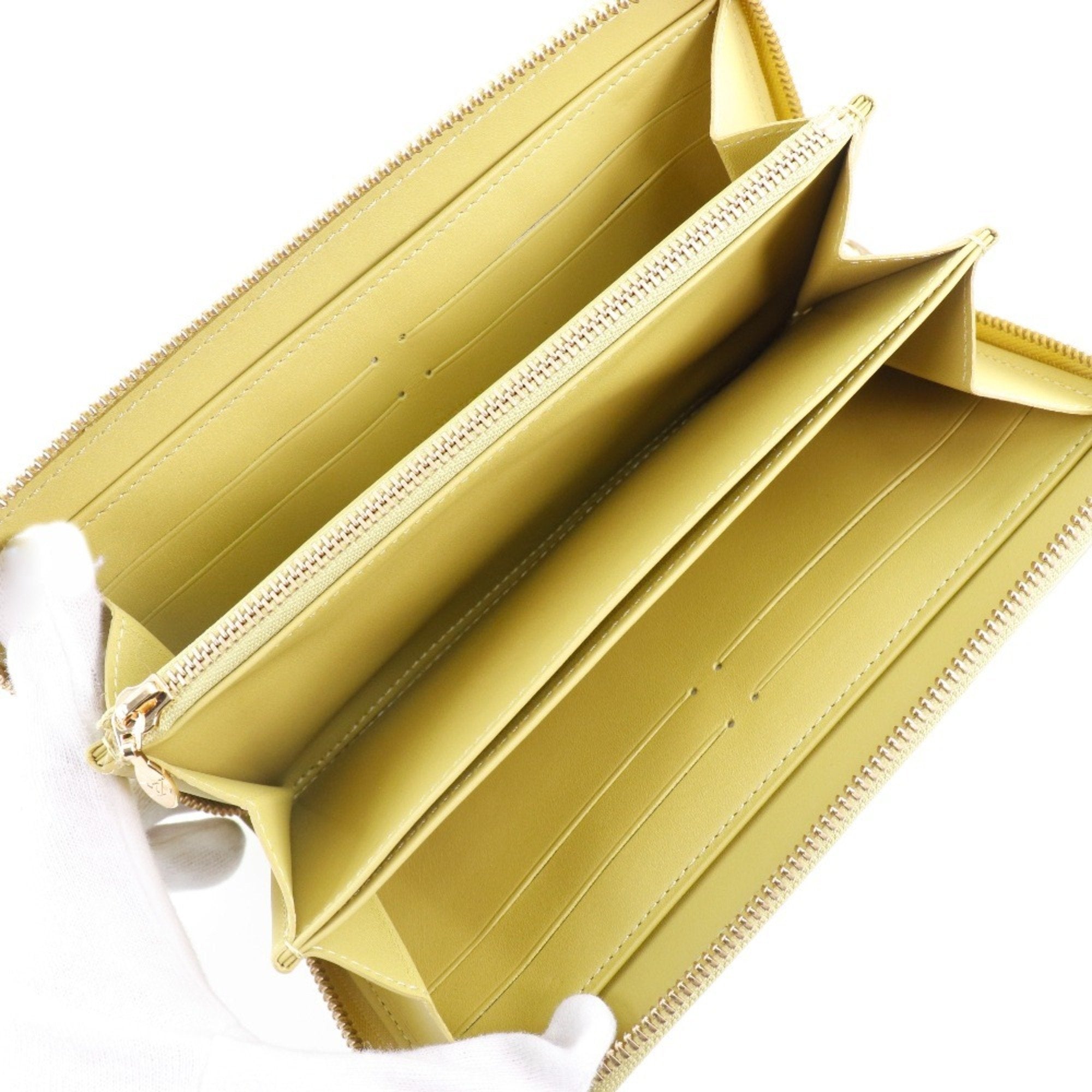 Louis Vuitton Yellow Canvas Portefeuille zippy wallet accessories
