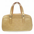 Louis Vuitton Gold Patent leather Shelton handbag bag