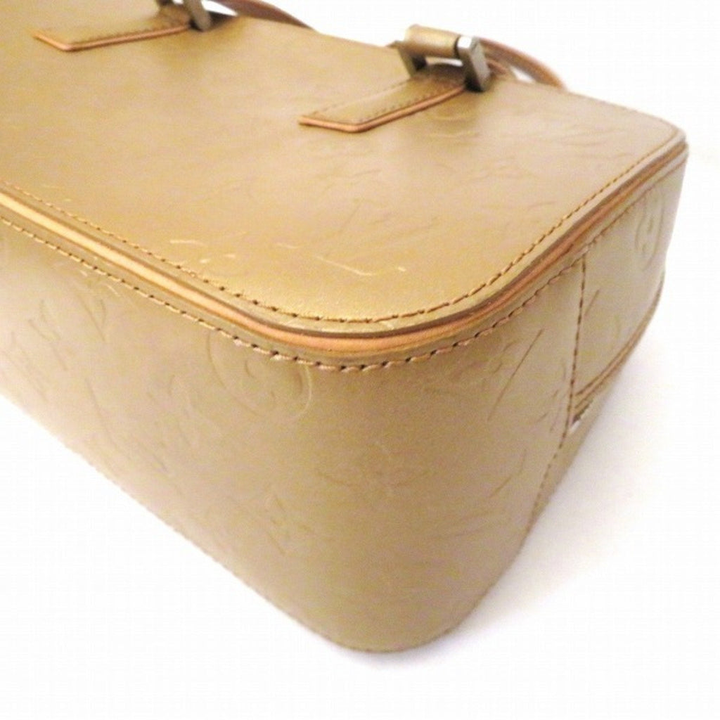 Louis Vuitton Gold Patent leather Shelton handbag bag