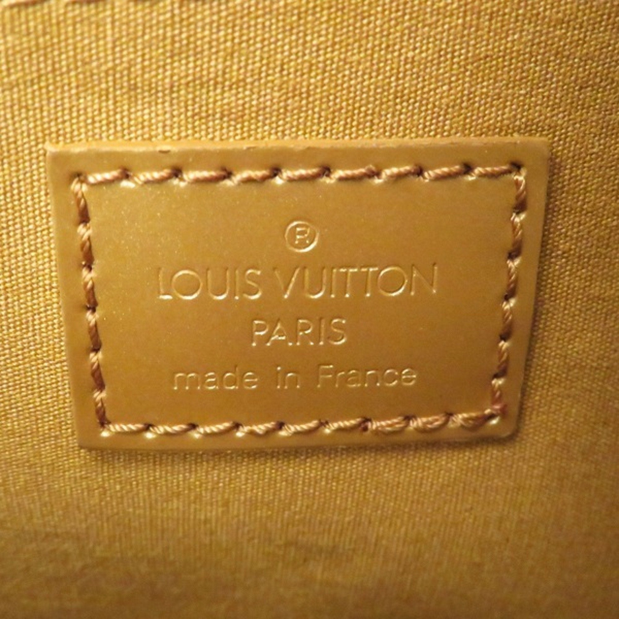 Louis Vuitton Gold Patent leather Shelton handbag bag