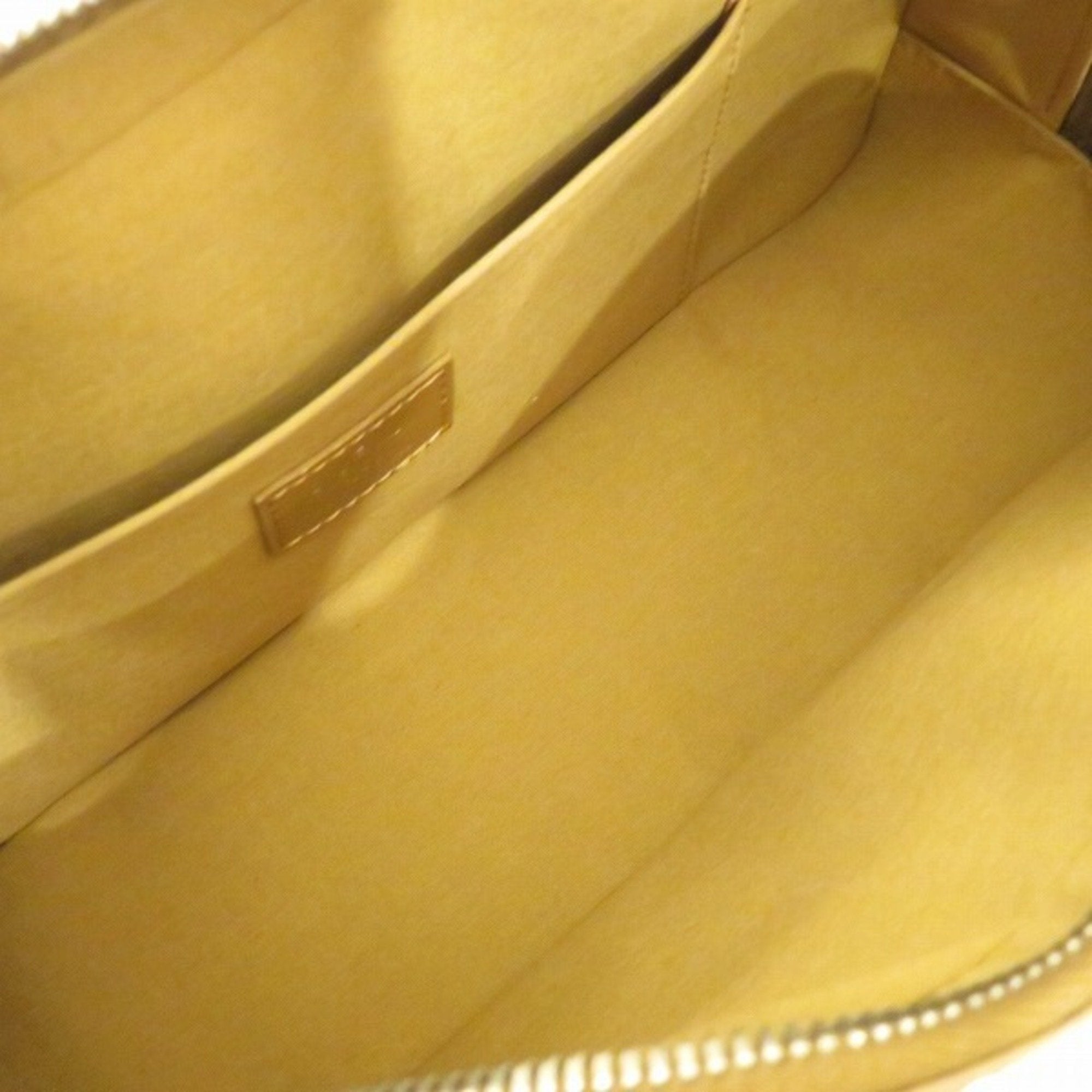 Louis Vuitton Gold Patent leather Shelton handbag bag