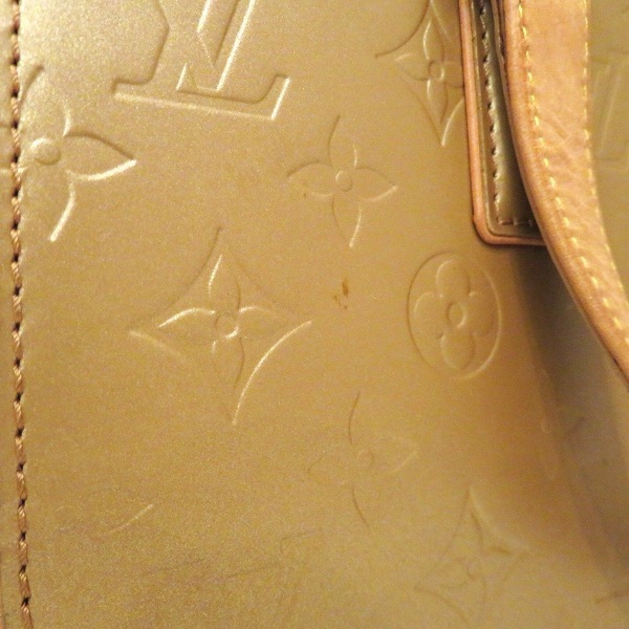 Louis Vuitton Gold Patent leather Shelton handbag bag