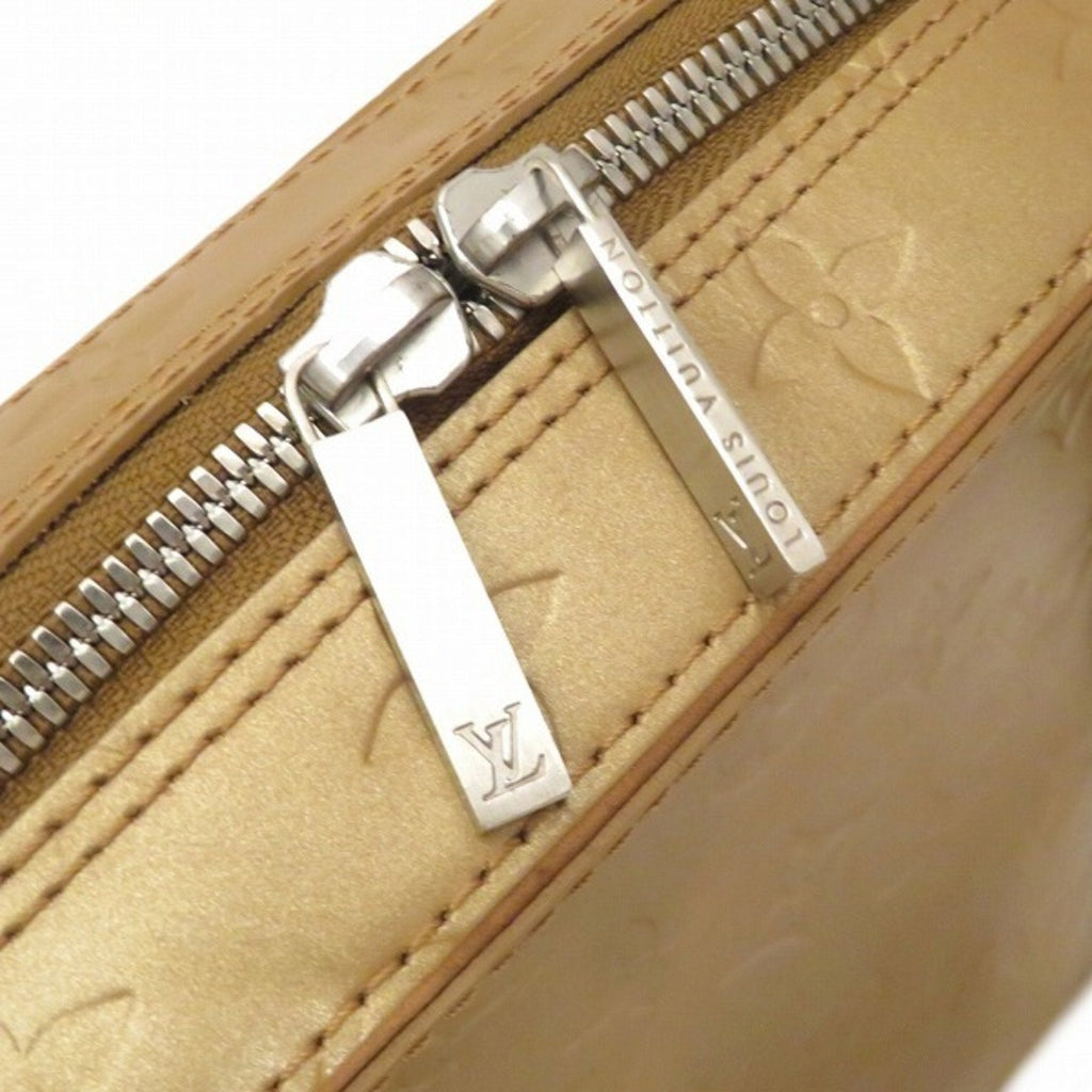 Louis Vuitton Gold Patent leather Shelton handbag bag