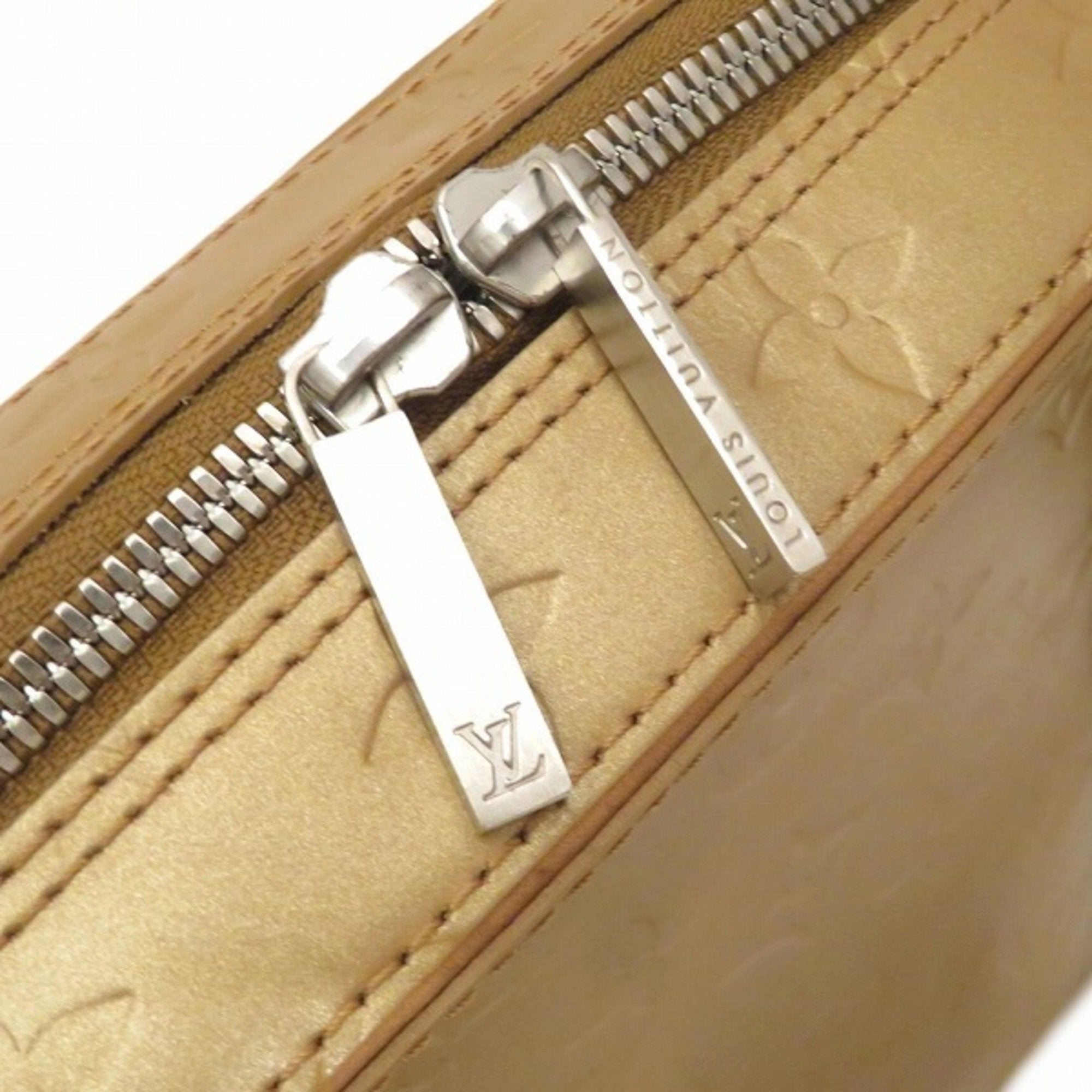 Louis Vuitton Gold Patent leather Shelton handbag bag