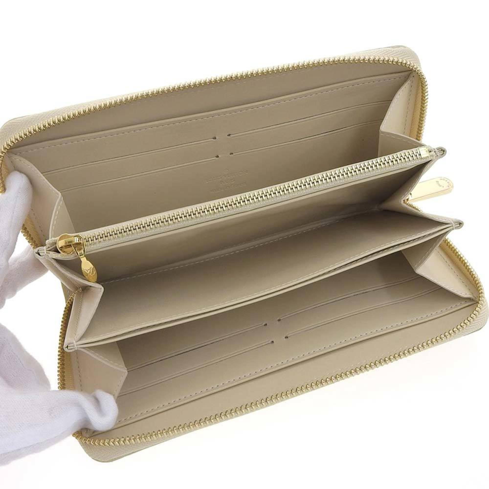 Louis Vuitton Yellow Patent leather Portefeuille zippy wallet accessories