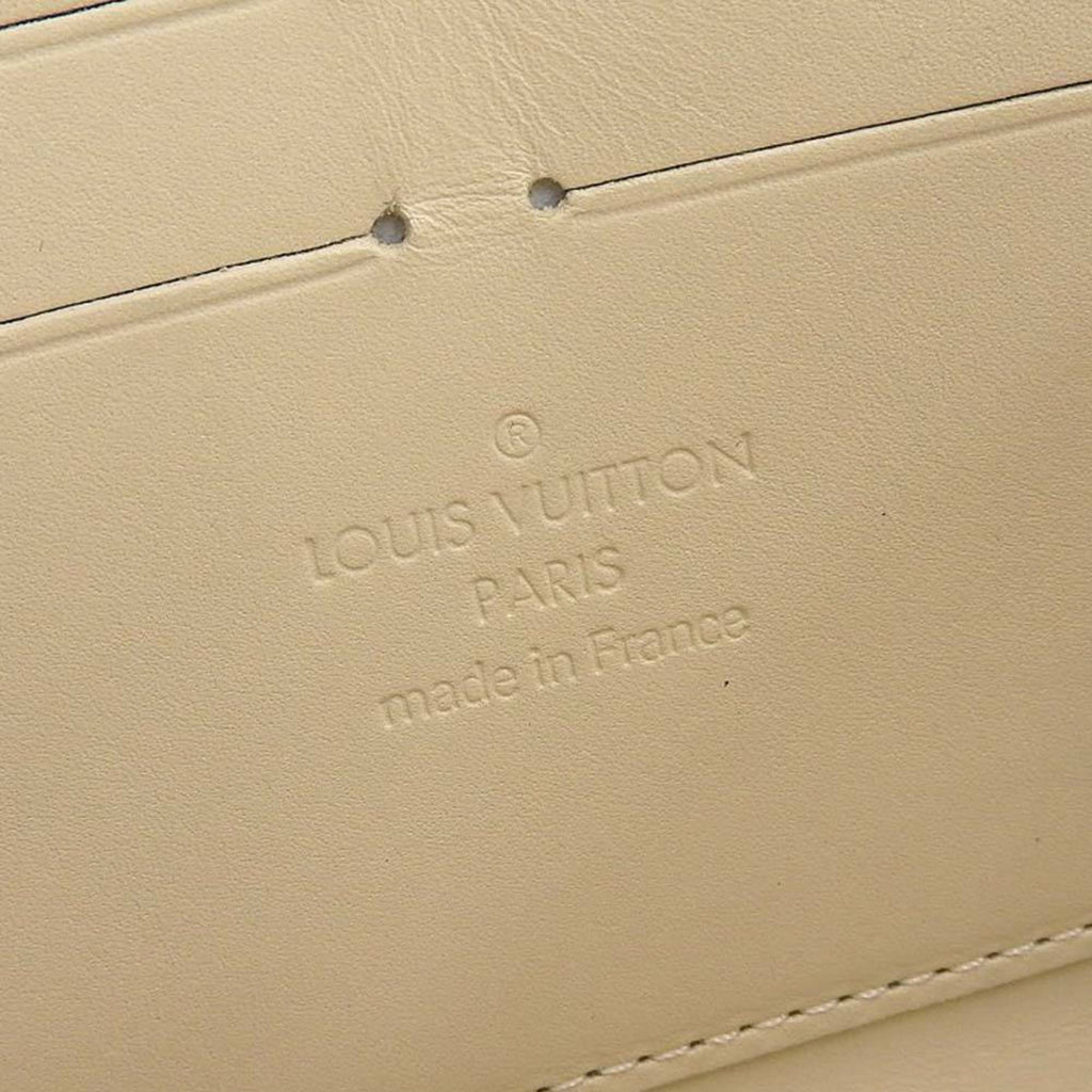 Louis Vuitton Yellow Patent leather Portefeuille zippy wallet accessories