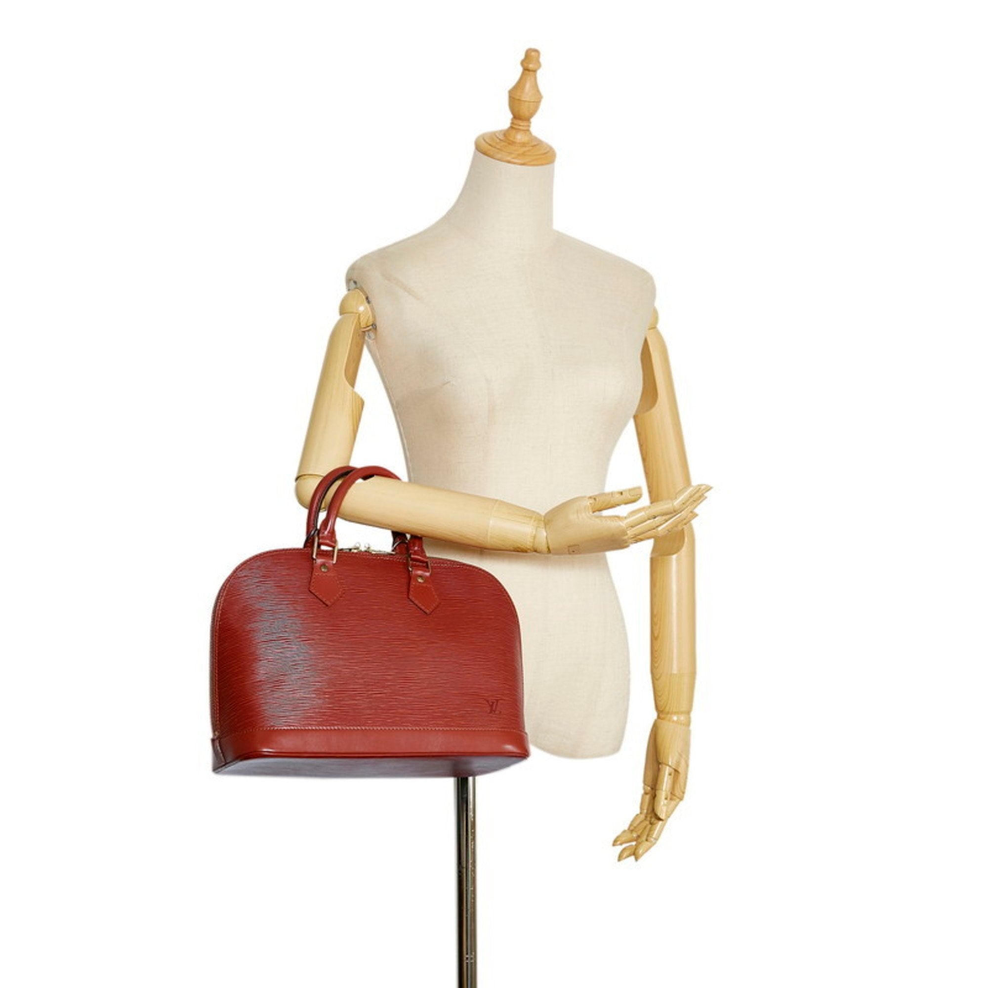 Louis Vuitton Brown Leather Alma handbag bag