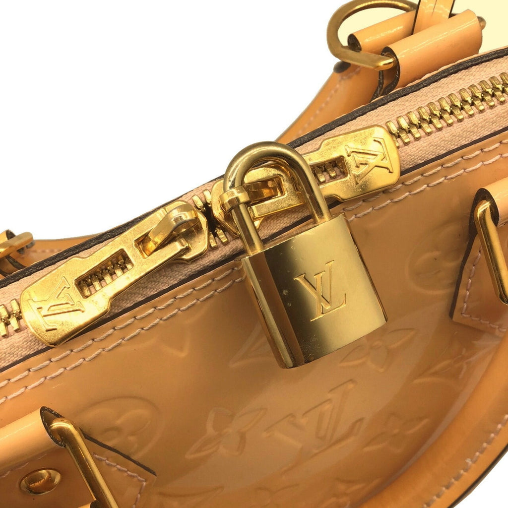 Louis Vuitton Beige Patent leather Alma handbag bag