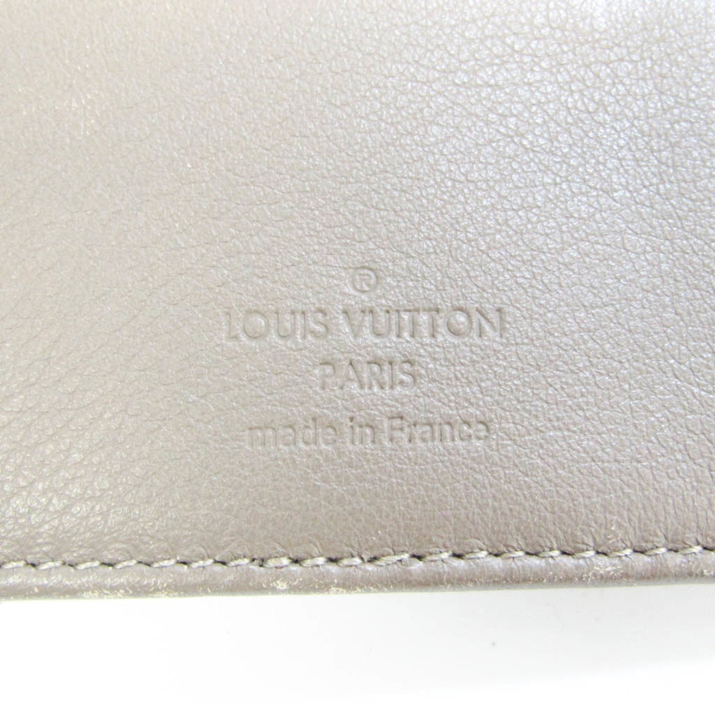 Louis Vuitton Beige Leather Mahina wallet accessories