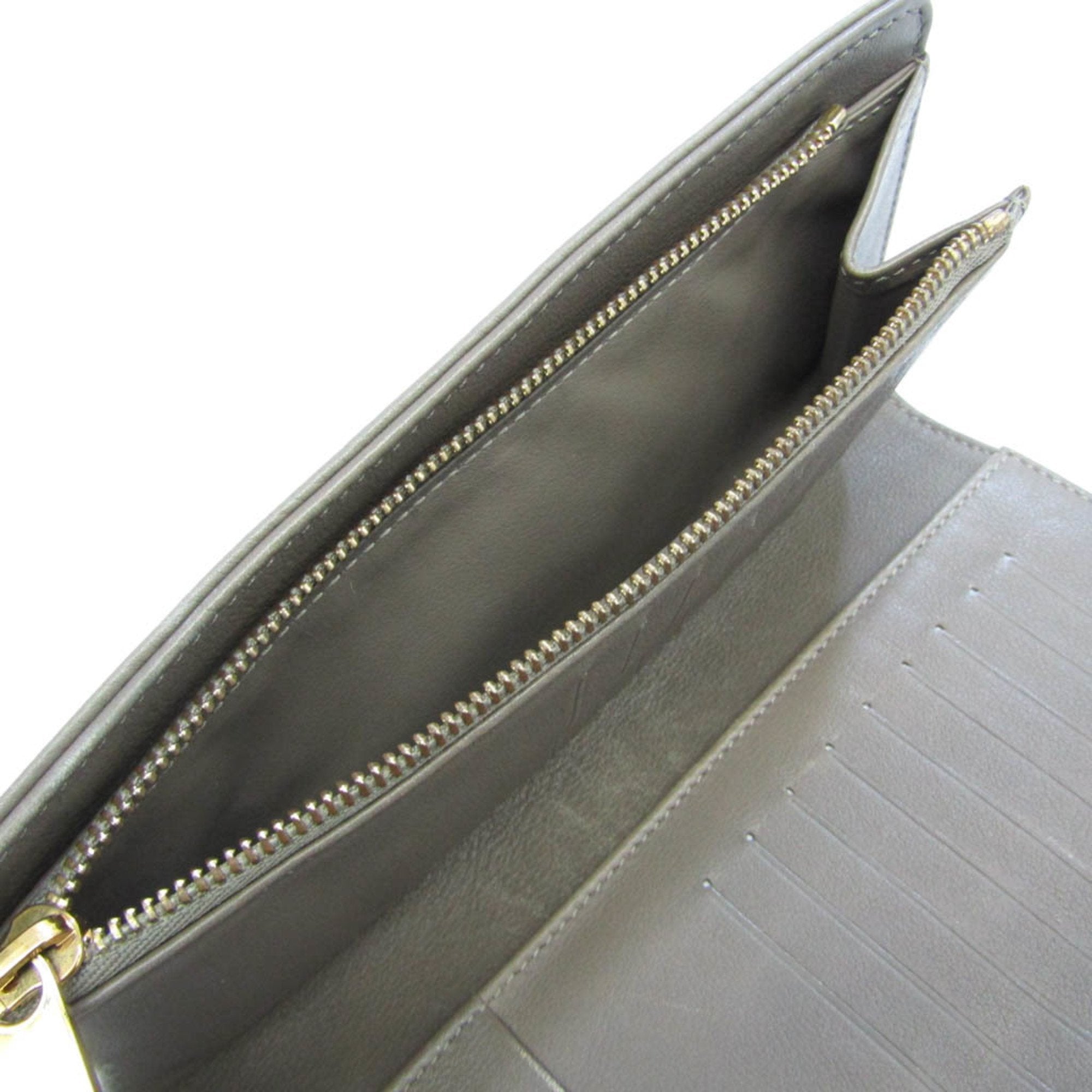 Louis Vuitton Beige Leather Mahina wallet accessories