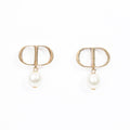 Christian Dior Petit CD Earrings Gold / Pearl Base Metal