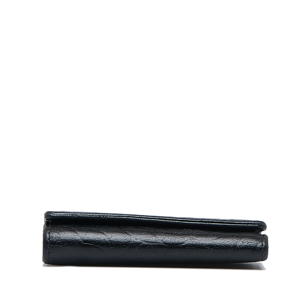 Chanel CC Camellia Leather Key Holder (SHG-YZObU4)