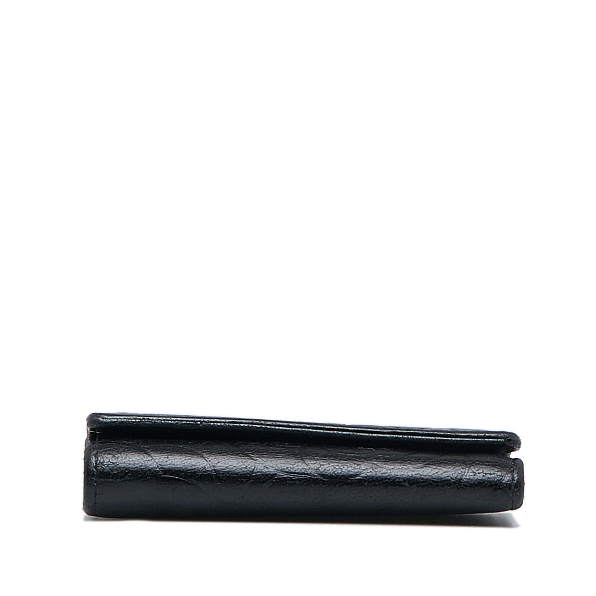 Chanel CC Camellia Leather Key Holder (SHG-YZObU4)
