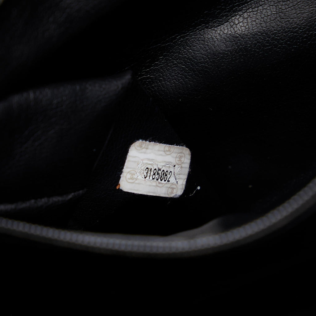 Chanel CC Quilted Lambskin Drawstring Backpack (SHG-86DOIB)