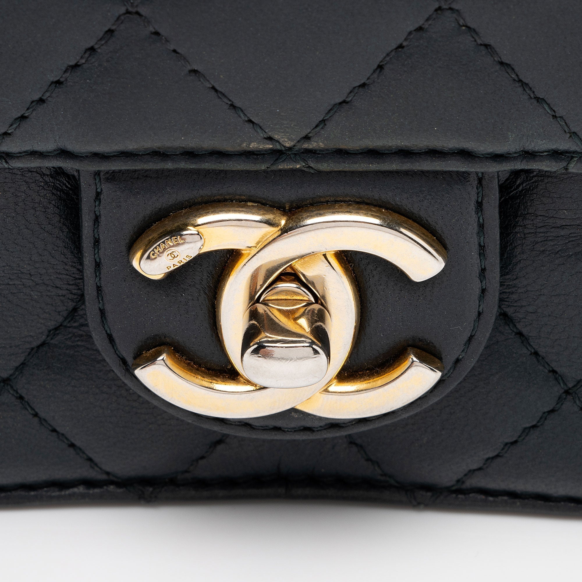 Chanel Lambskin Crossing Times Mini Flap Bag (SHF-Tv2M1K)