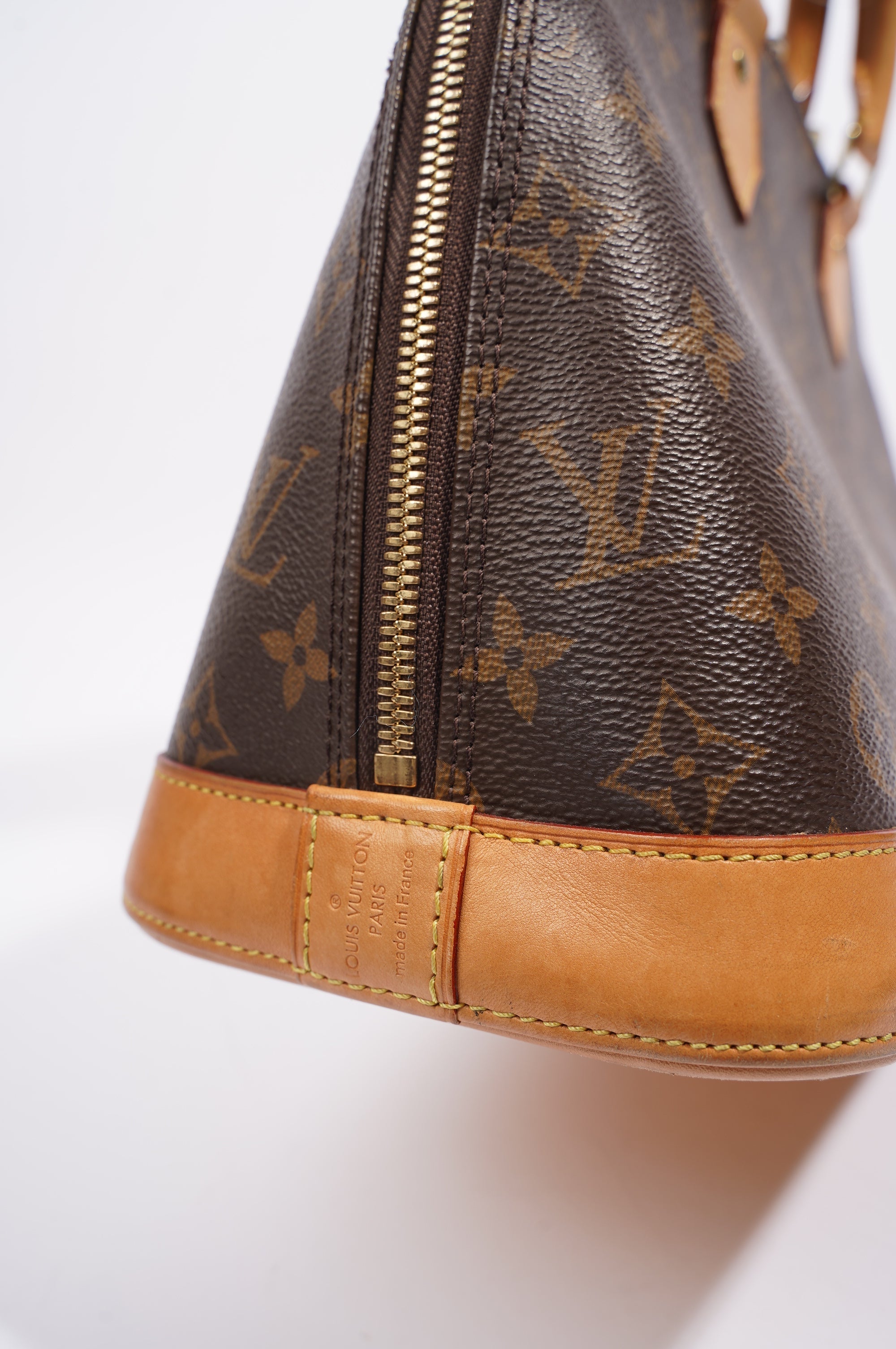 Louis Vuitton Womens Alma Monogram PM