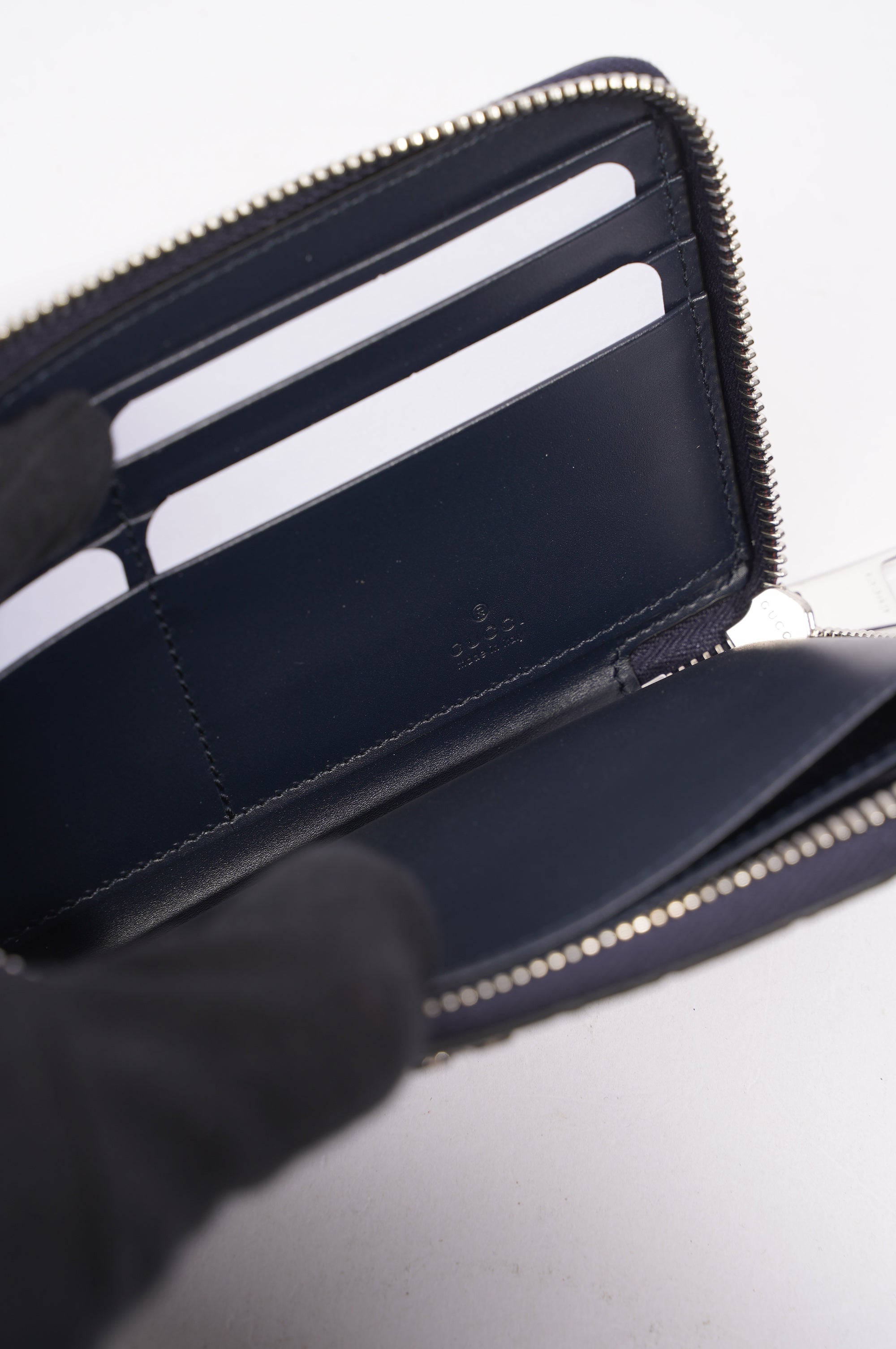 Gucci Womens Guccissima Bi-Fold Wallet Black Leather