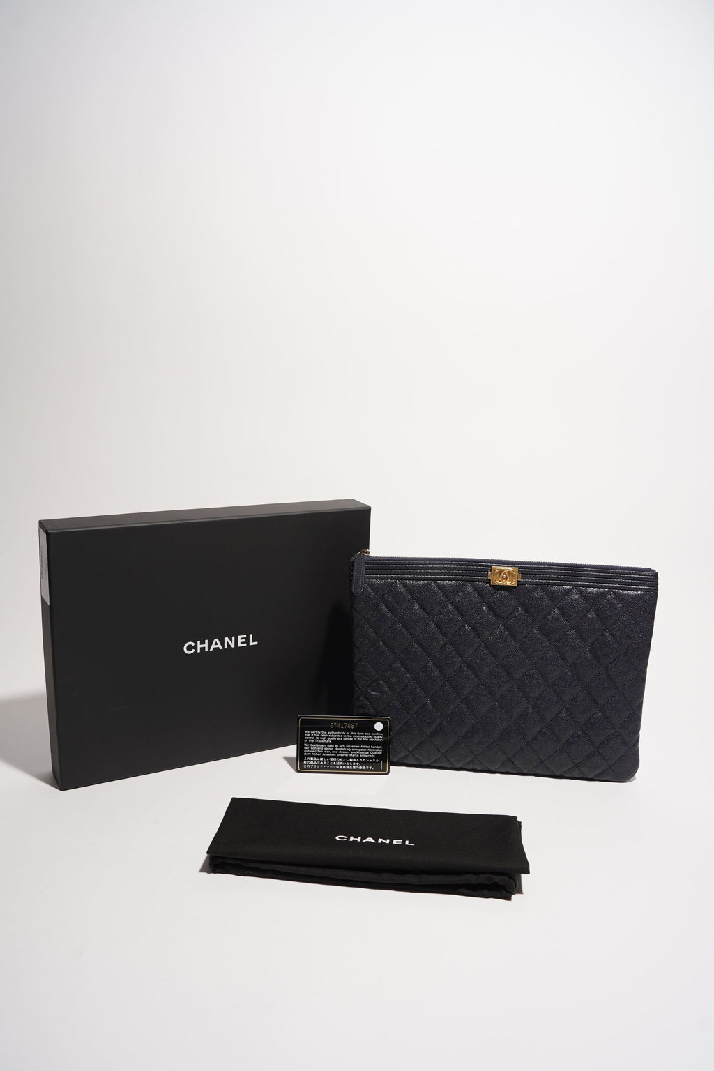 Chanel Womens Quilted Caviar Leather Boy Pouch Navy Large