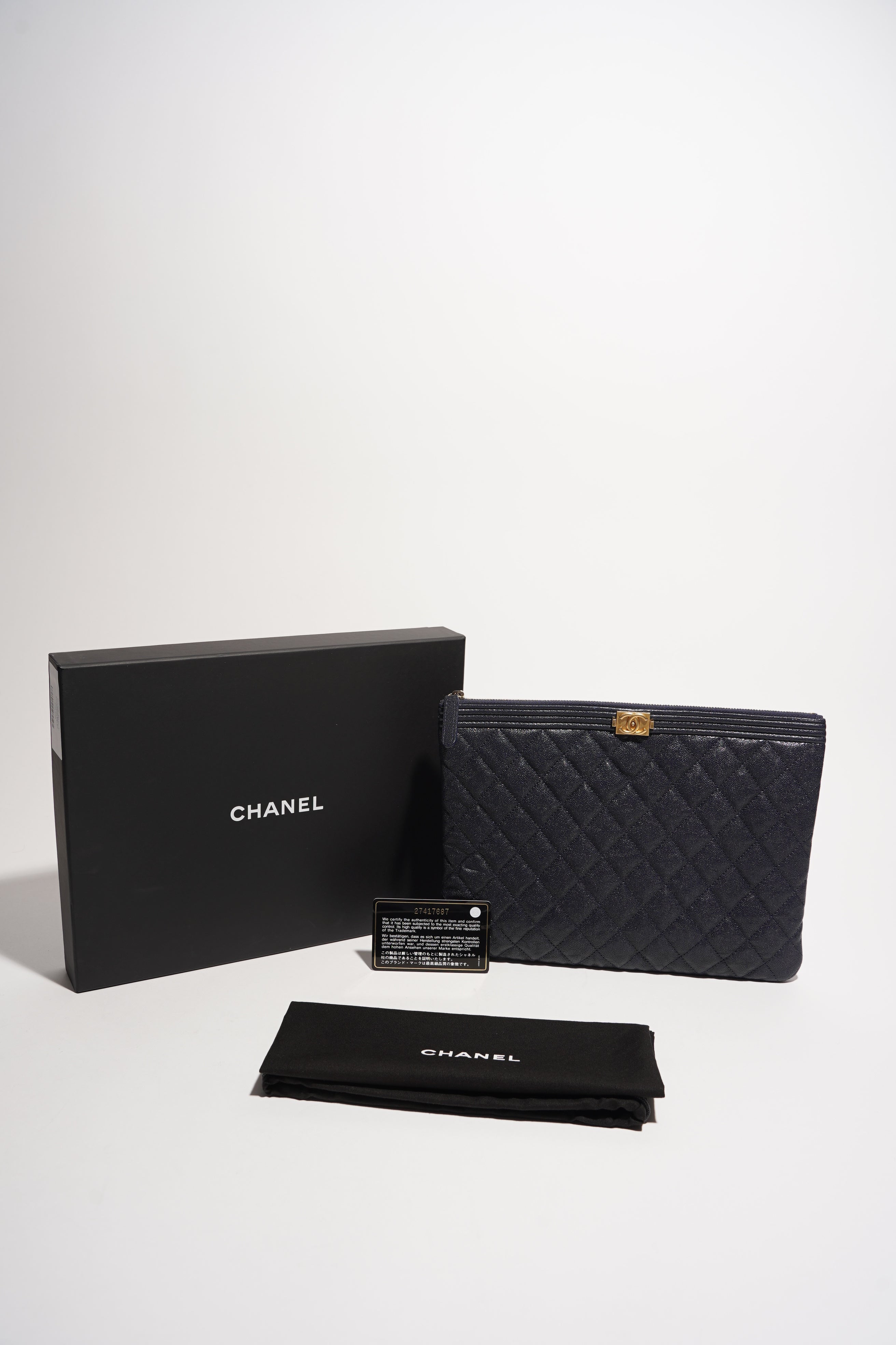 Chanel Womens Quilted Caviar Leather Boy Pouch Navy Large