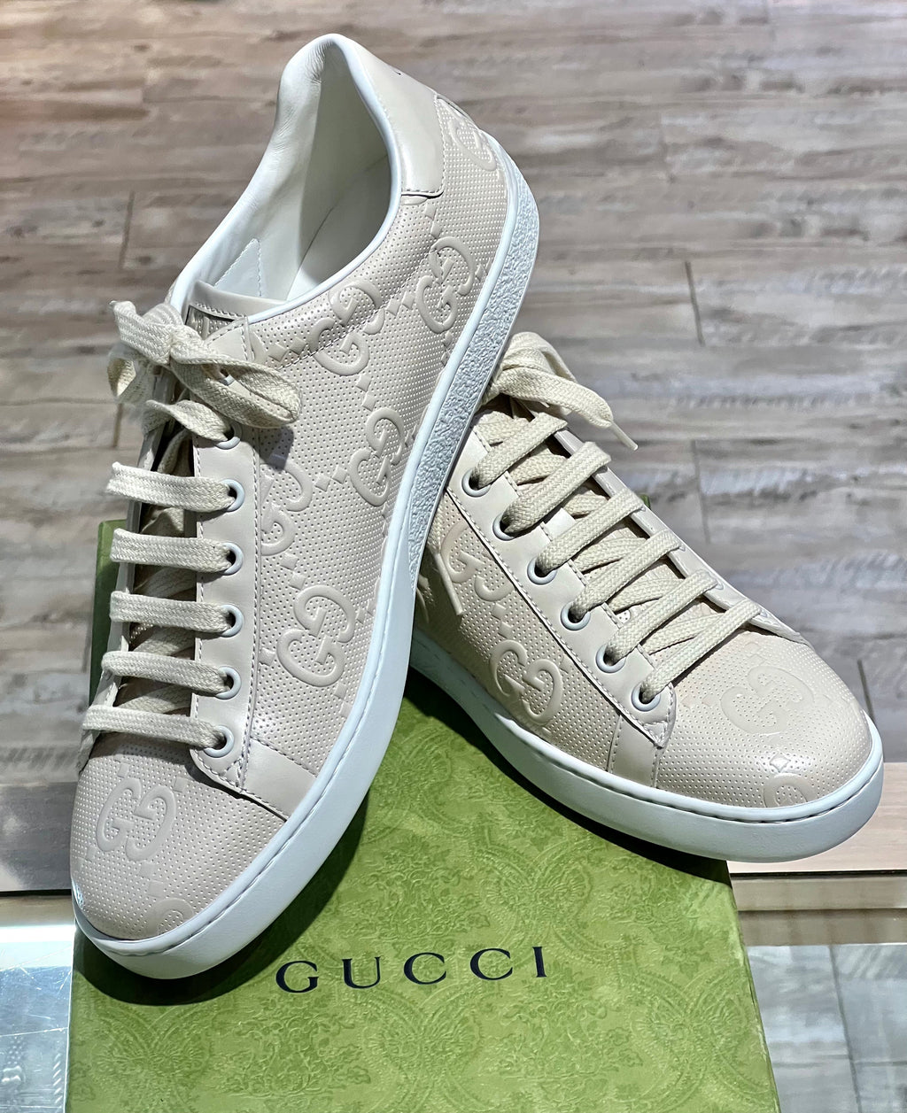 GUCCI GG EMBOSSED ACE SNEAKERS