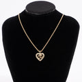 Christian Dior CD Heart Motif Necklace Gold Rhinestone