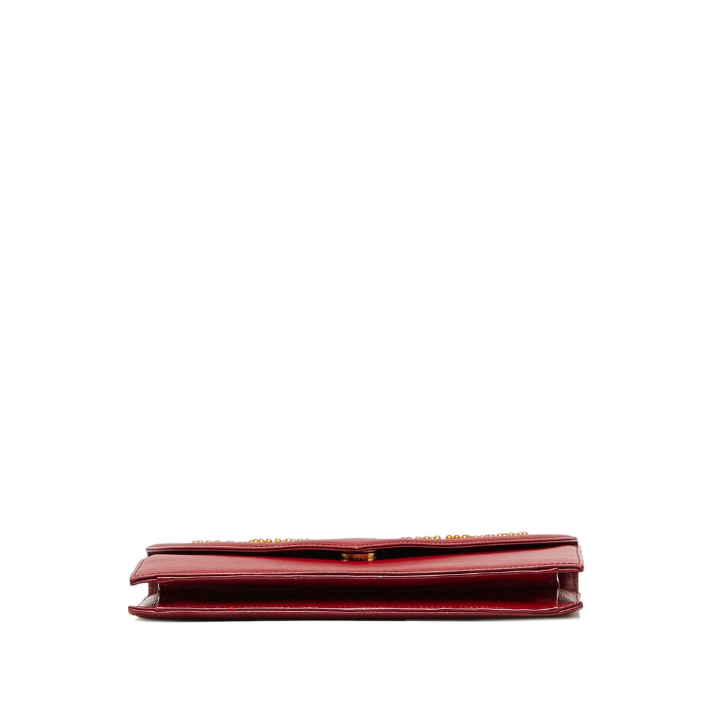 Saint Laurent Studded Leather Clutch Bag (SHG-ptOwqf)