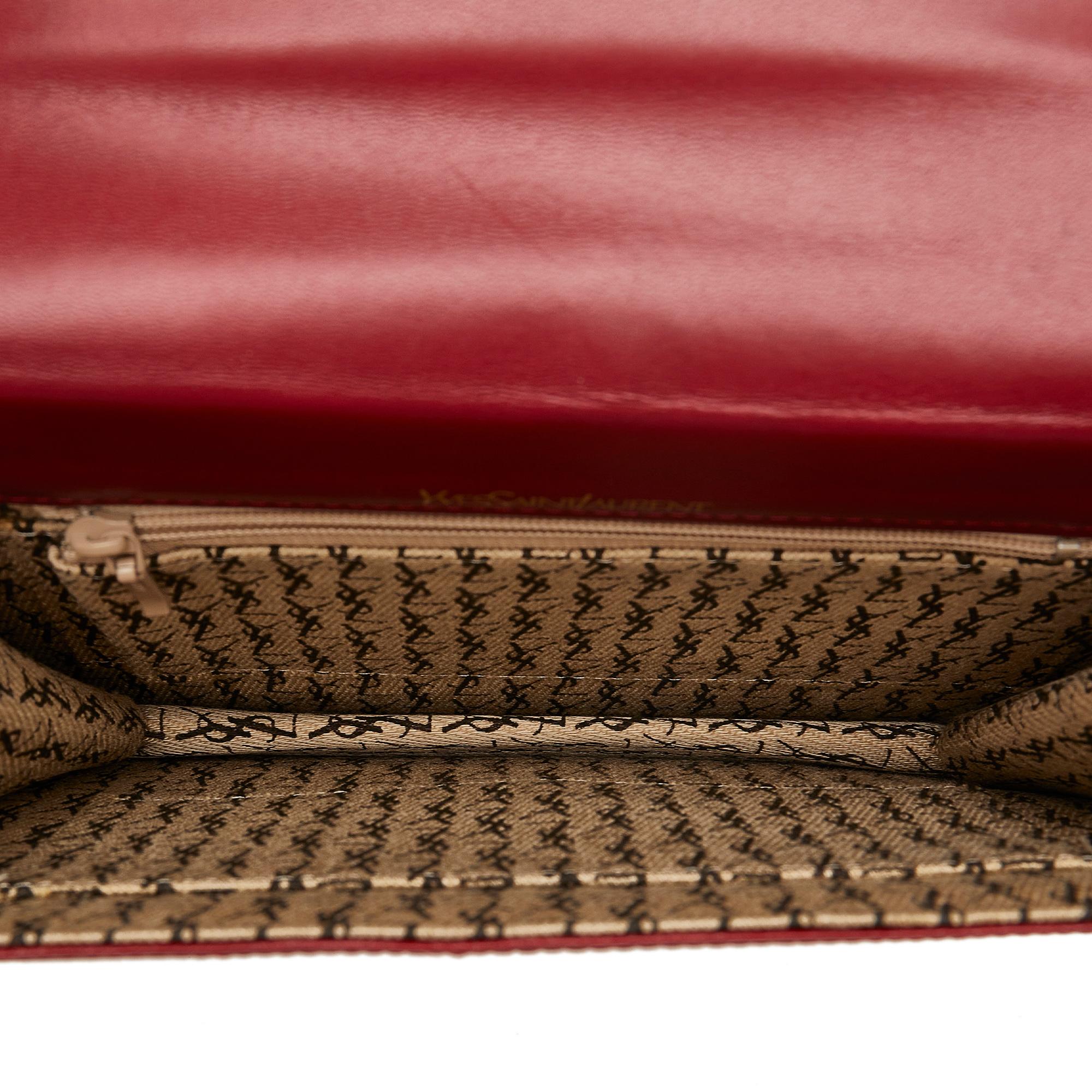 Saint Laurent Studded Leather Clutch Bag (SHG-ptOwqf)