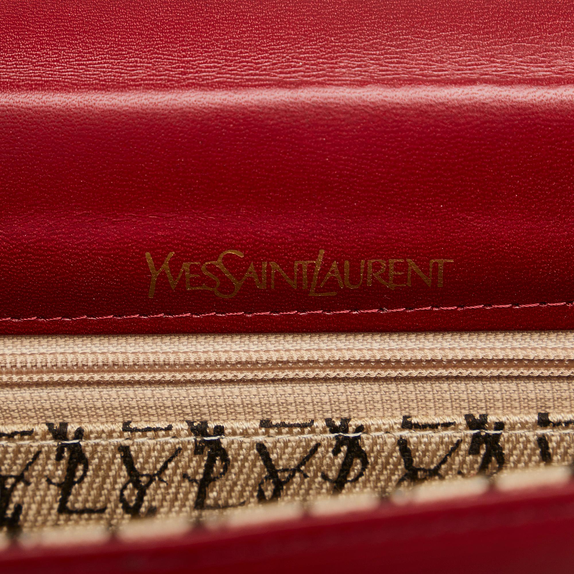 Saint Laurent Studded Leather Clutch Bag (SHG-ptOwqf)