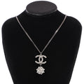 Chanel Logo Mirror Ball Necklace Silver / Pearl Base Metal
