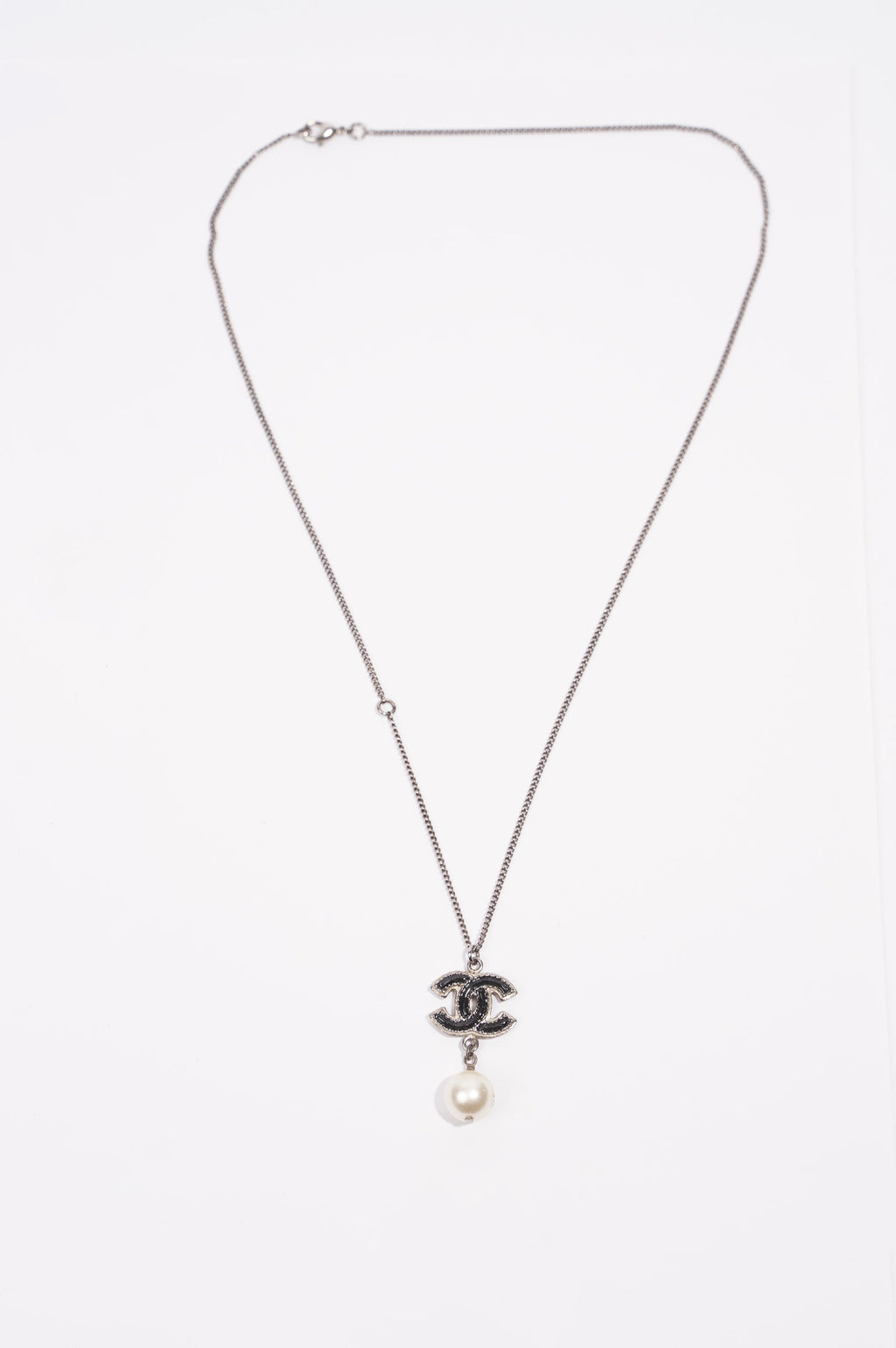 Chanel Pearl Logo Necklace Silver / Black Base Metal