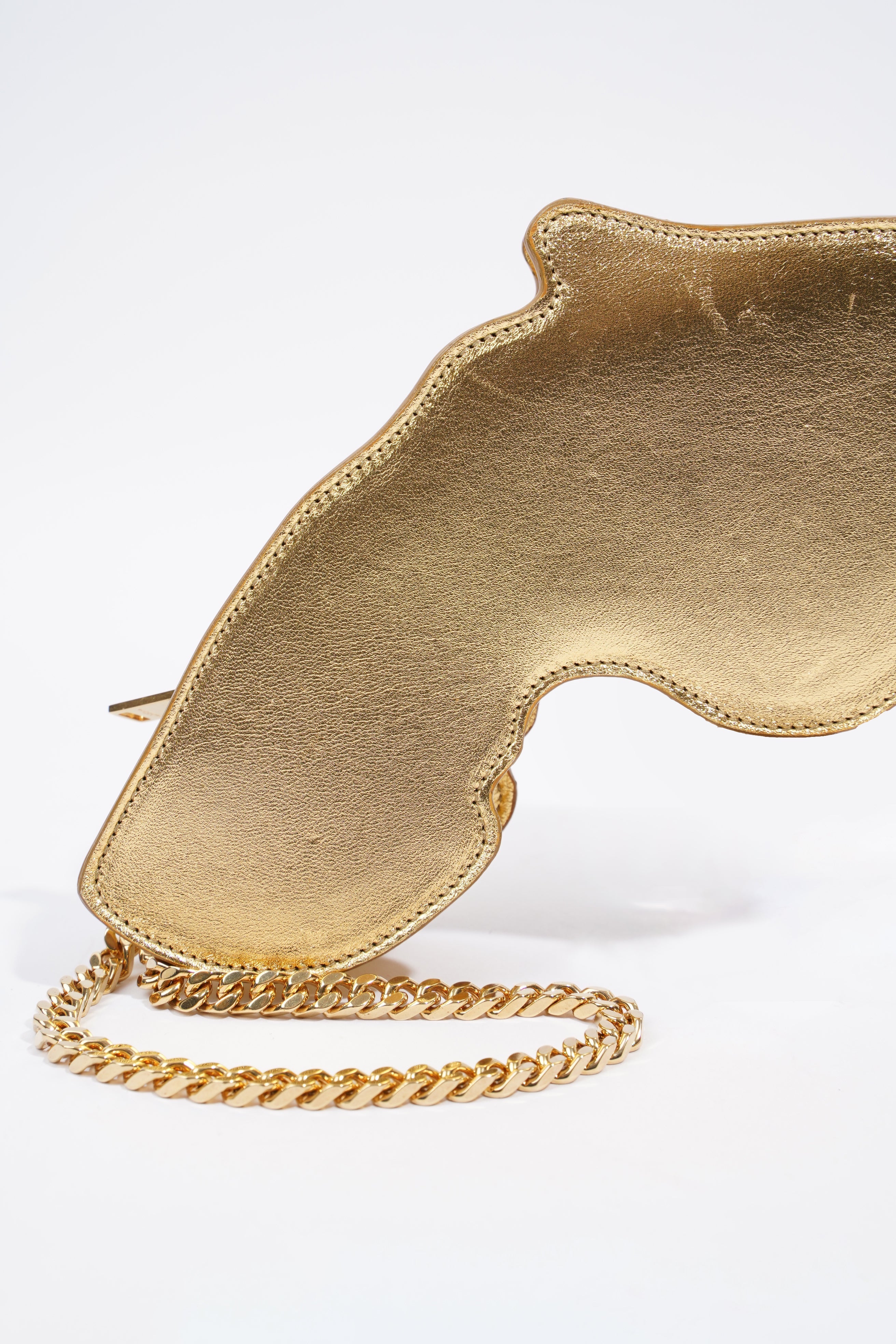 Saint Laurent Pistol Clutch Gold Leather