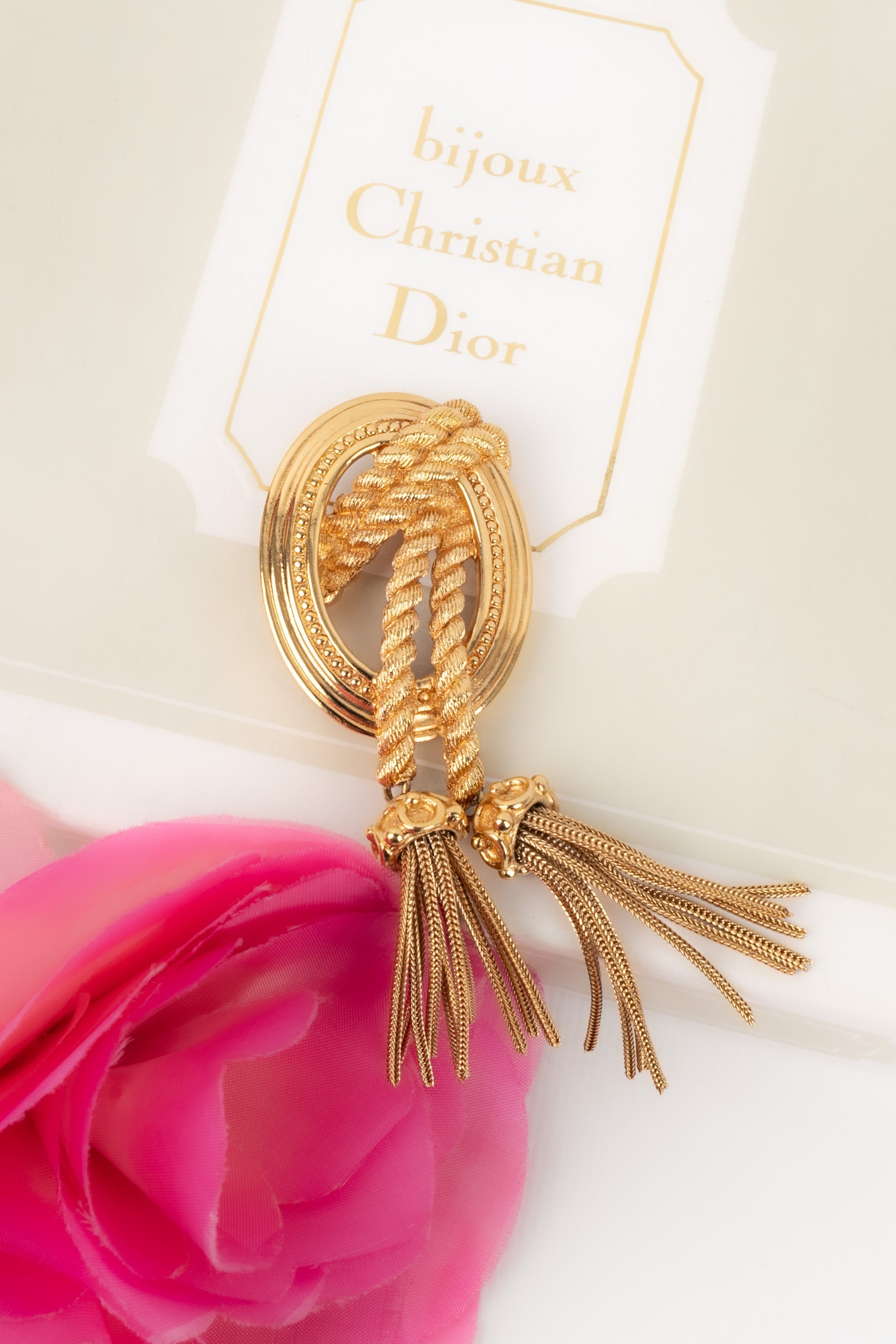 Broche en métal dor Dior