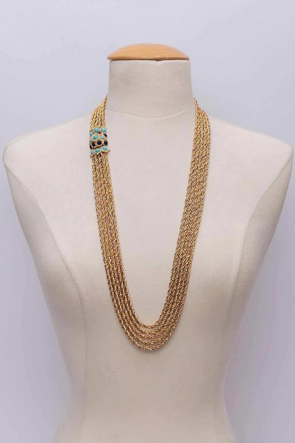 Collier en métal doré et fermoir bijou Dior